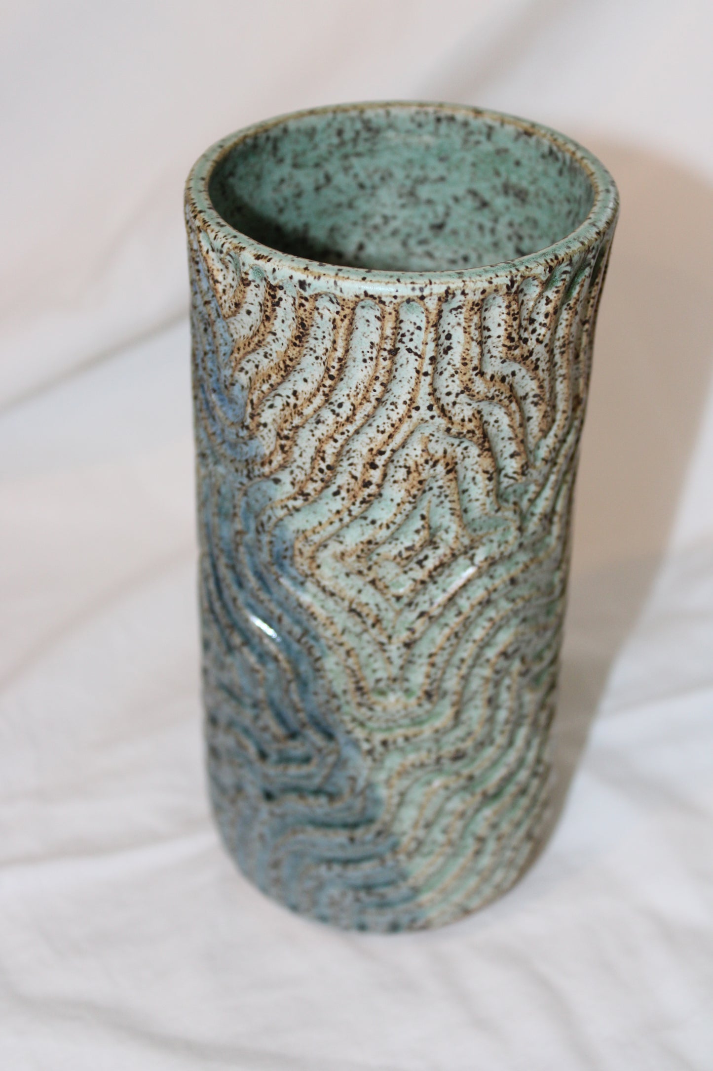 Carved blue and green vase