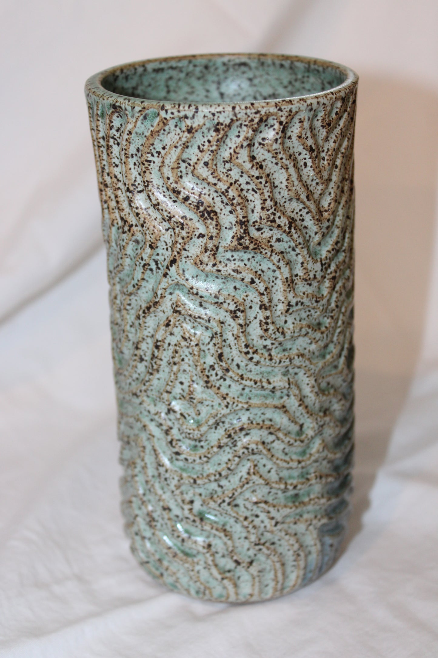 Carved blue and green vase