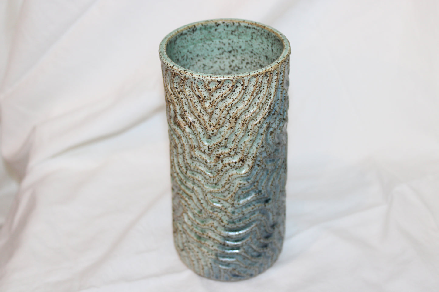 Carved blue and green vase