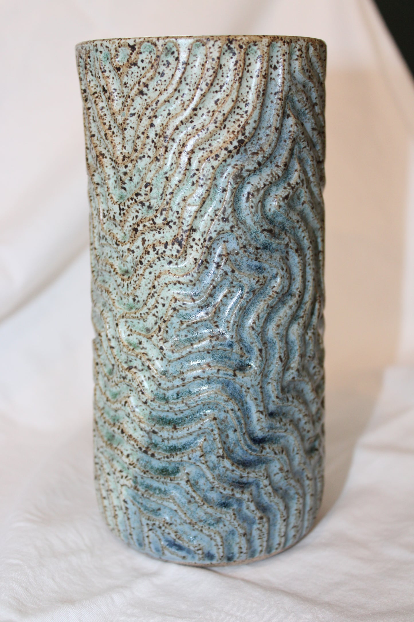 Carved blue and green vase